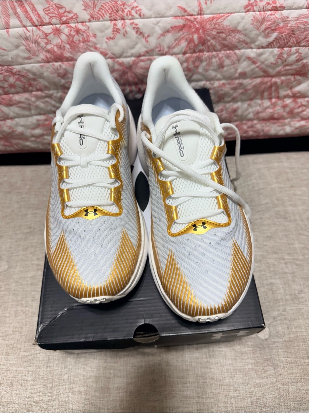 Under Armour Women’s White and Gold  Infinite Pro Sneakers